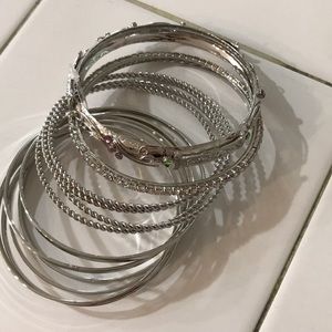 New silver tone bangles